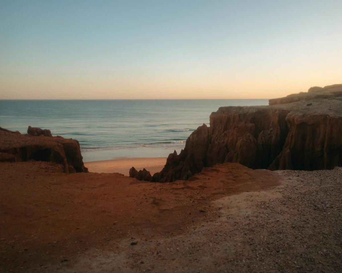 Sunset light on the Algarve coastline and Atlantic Ocean